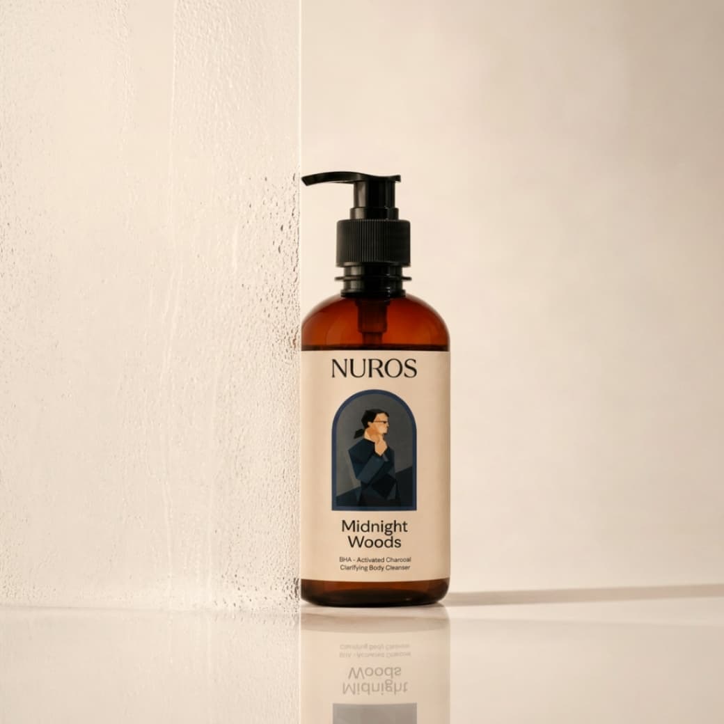 NUROS Midnight Woods bottle beside a wet textured wall