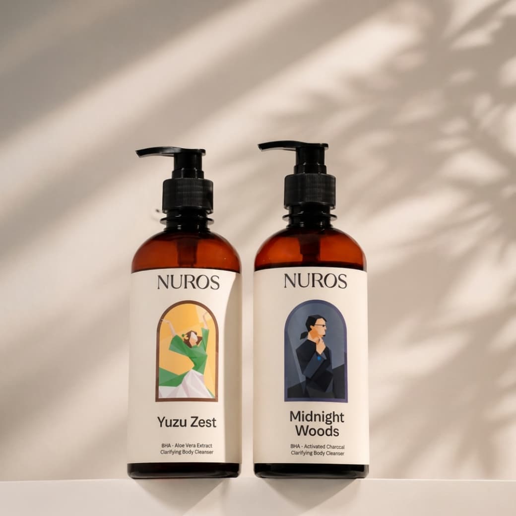 NUROS Yuzu Zest and Midnight Woods bottles side by side